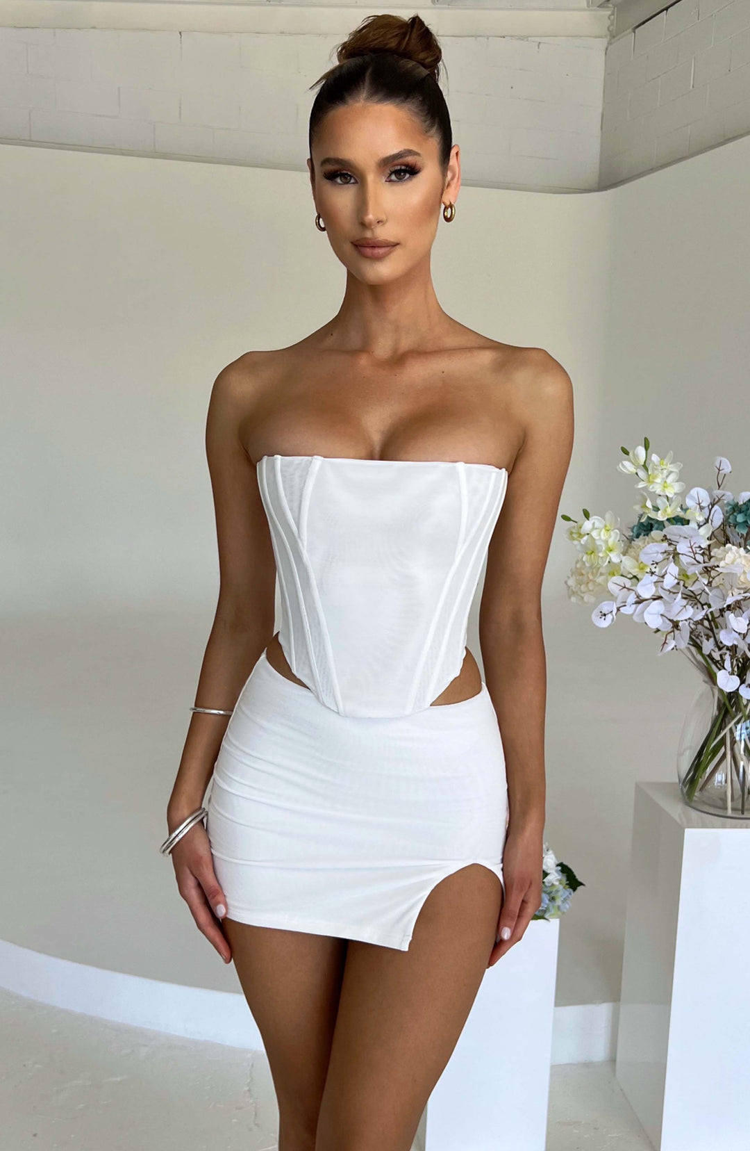 Aveloria Mini Skirt in White by Clandour, product photo 1