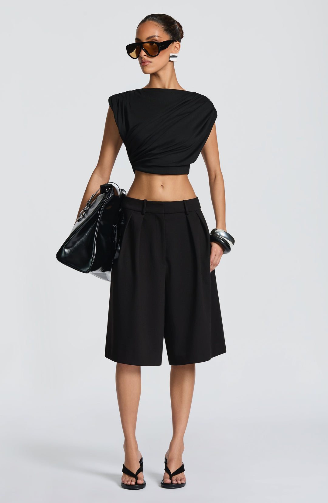 Corari Bermuda Shorts in Black by Clandour, product photo 1