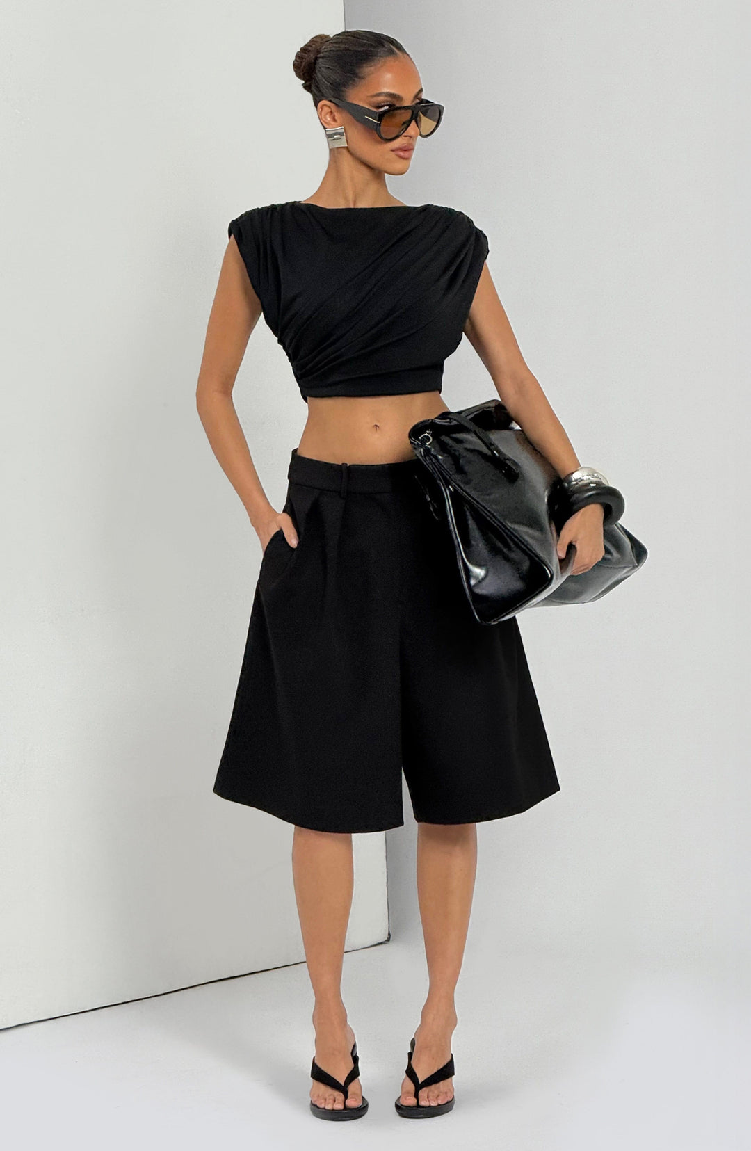 Corari Bermuda Shorts in Black by Clandour, product photo 9