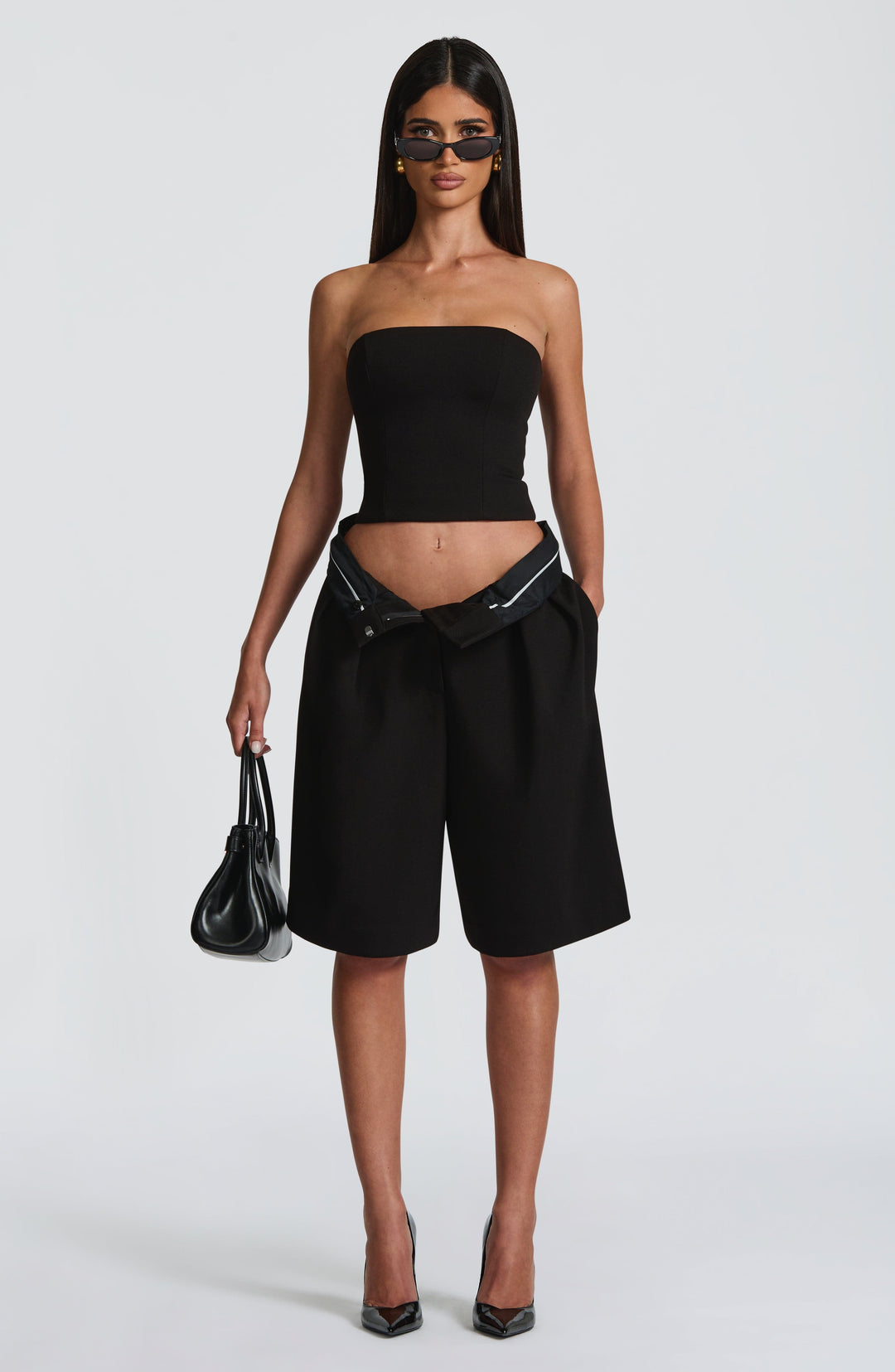 Corari Bermuda Shorts in Black by Clandour, product photo 12