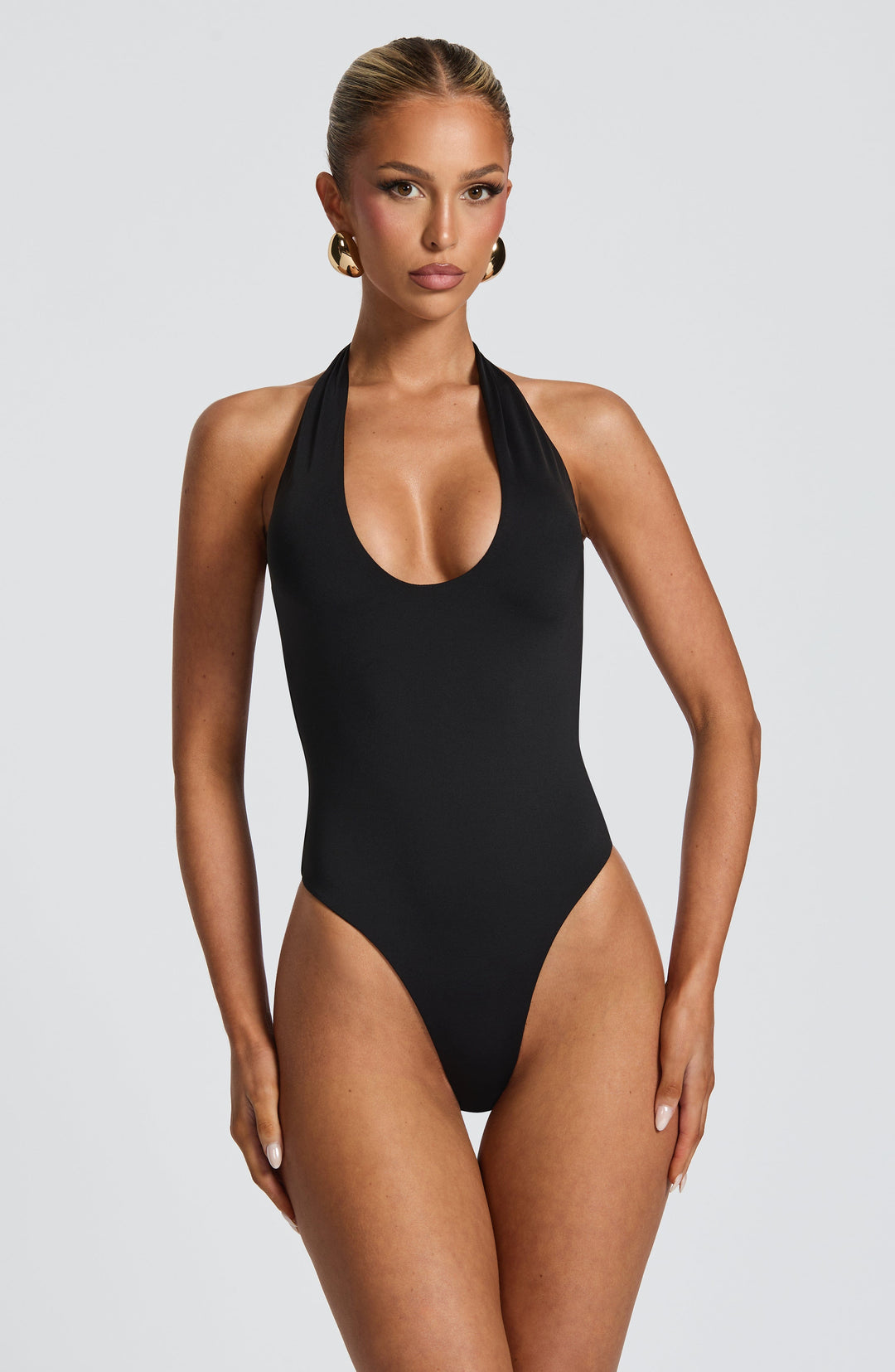 Rheaina Bodysuit in Black by Clandour, product photo 1