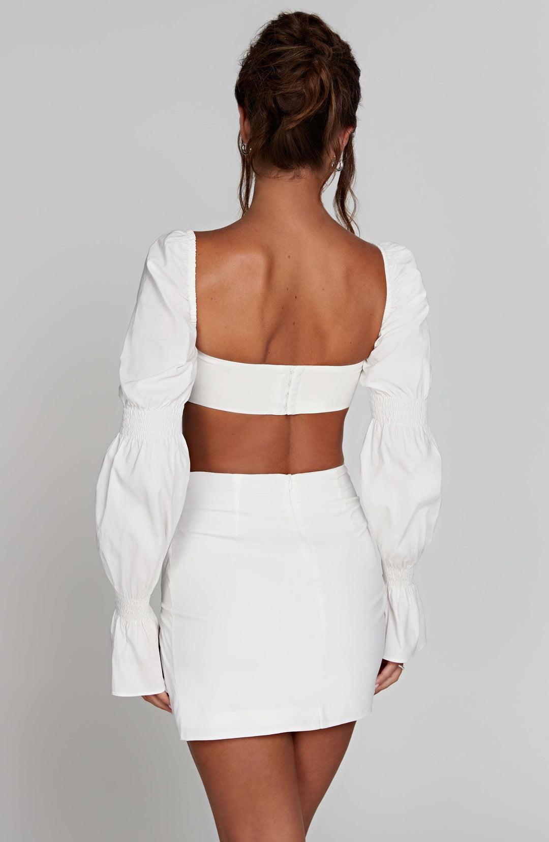 Rheanora Mini Skirt in White by Clandour, product photo 5