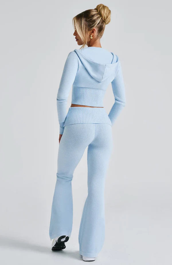 Clandour Seraette baby blue knit set — back view showing ribbed waistband and flared silhouette